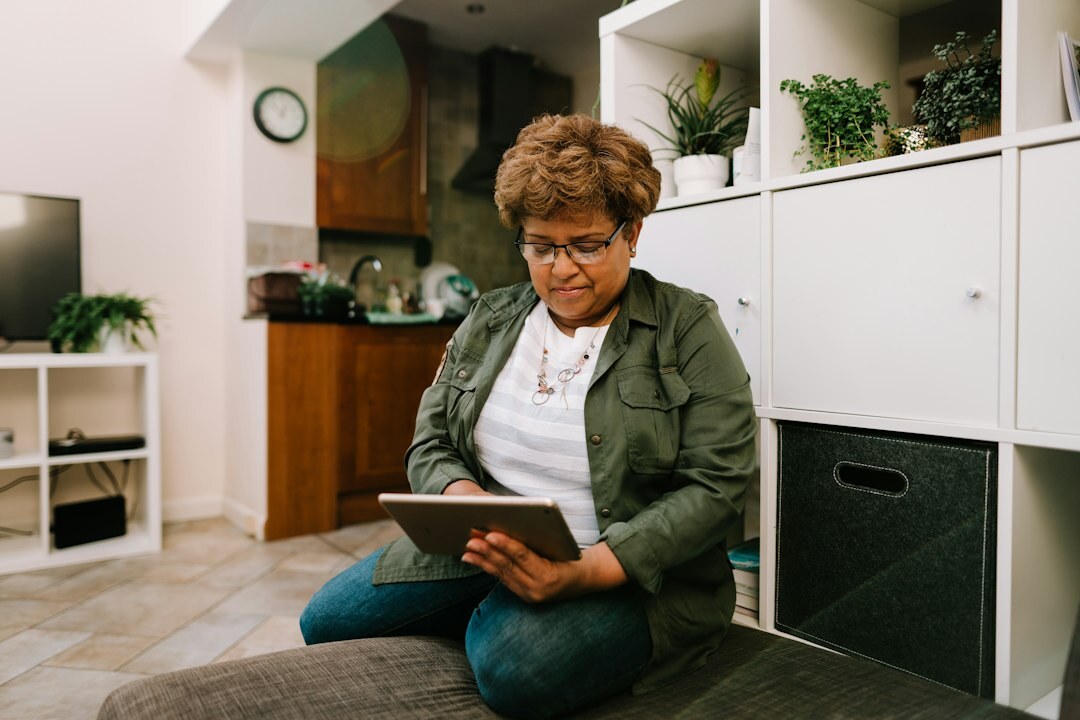 elderly person with tablet